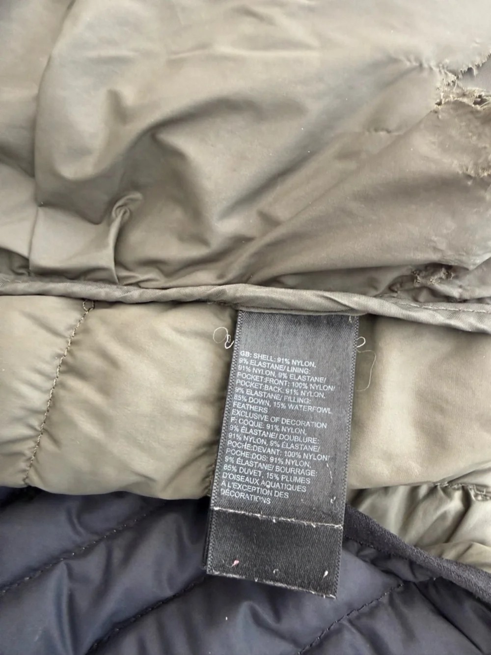 The North Face Quilted Hooded Jacket in Olive and Black